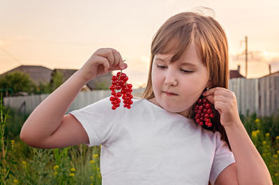 Portrait of girl holding ice cream