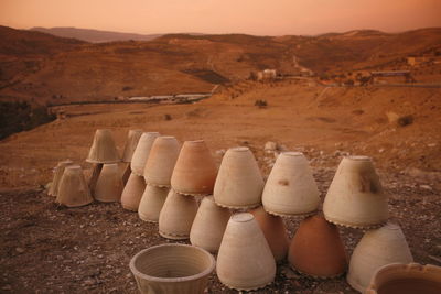 Mud pots on barren landscape