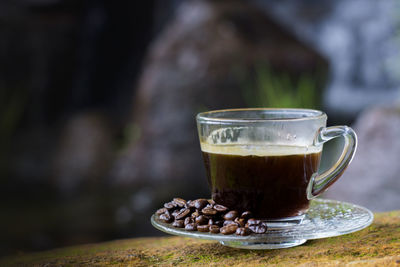 Close-up of coffee cup on table