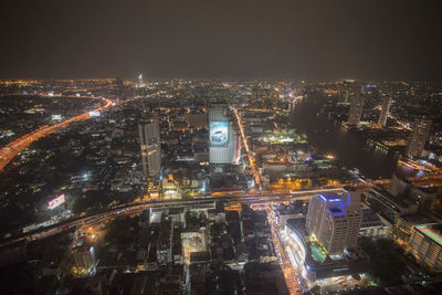 Illuminated cityscape at night