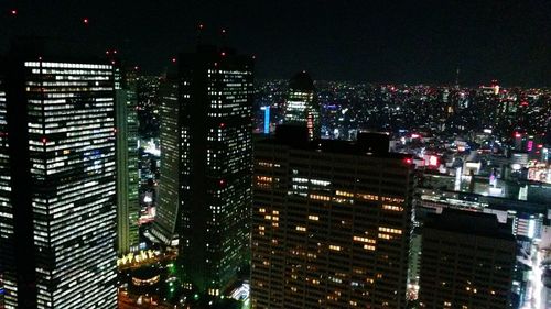 Illuminated cityscape at night