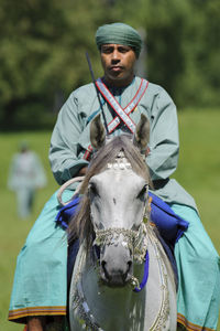 Portrait of teenage boy riding