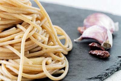 Close-up of pasta in plate on table