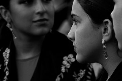 Close-up of women looking away during festival