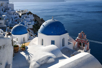 High angle view of white and buildings by mosque