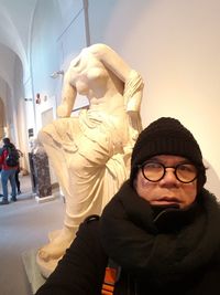 Portrait of a young man in snow