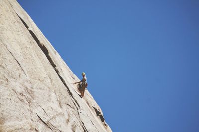 Low angle view of clear blue sky