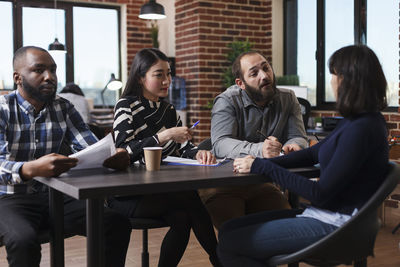 Business people taking interview in office