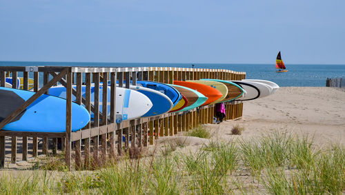 Colorful paddle boards on the beach