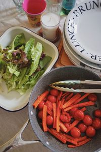 High angle view of chopped vegetables in bowl on table