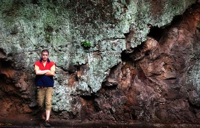 Woman standing on rock formation