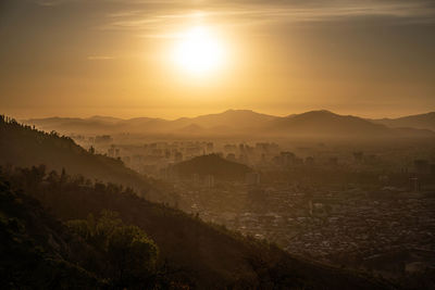 Scenic view of landscape against sky during sunset