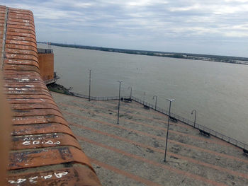 High angle view of built structure in calm sea