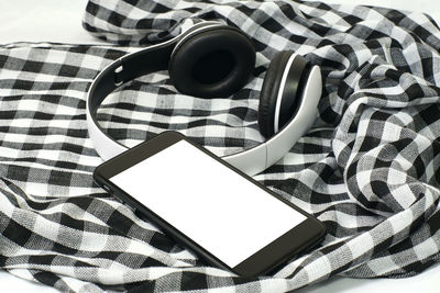 High angle view of smart phone on table
