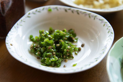 High angle view of chopped chili served in plate