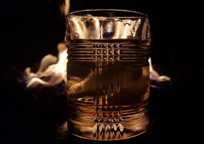 Close-up of drink against black background