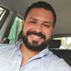 Portrait of young man in car