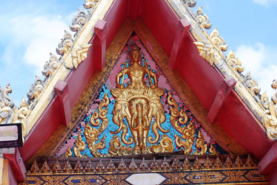 Low angle view of ornate building against sky