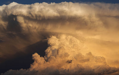 Low angle view of clouds in sky during sunset