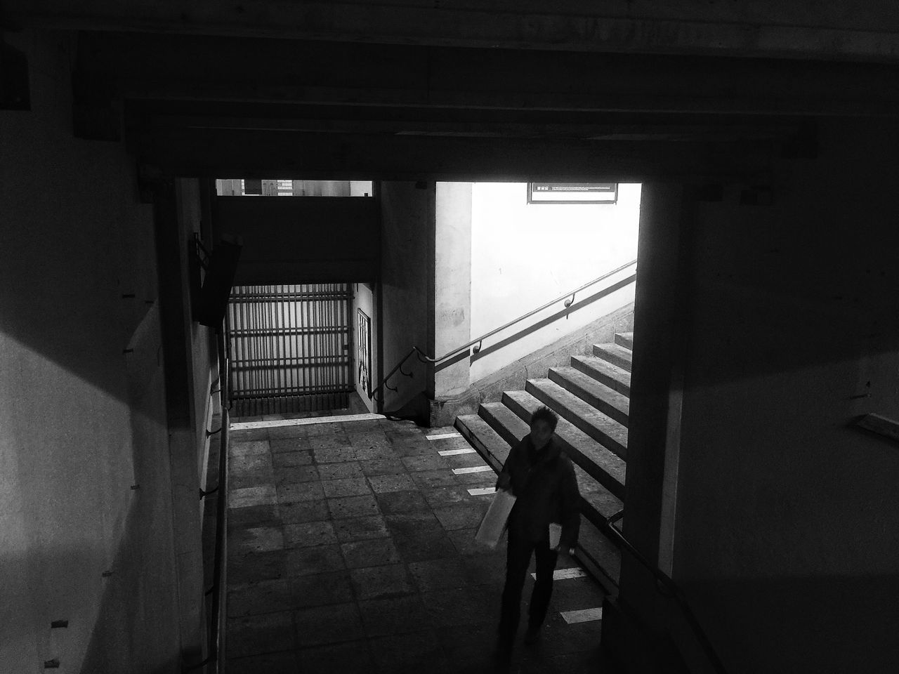 indoors, architecture, built structure, transportation, the way forward, sunlight, window, mode of transport, shadow, narrow, empty, wall - building feature, bicycle, building, land vehicle, railing, day, steps