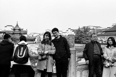 Group of people standing in front of building