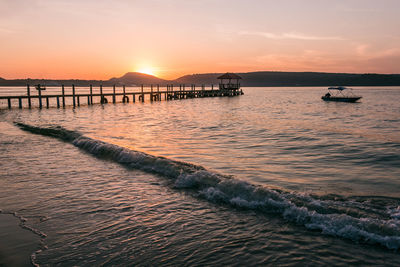 Scenic view of sea against sky during sunset