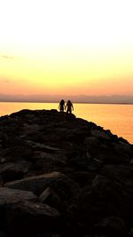 Scenic view of sea at sunset