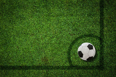 High angle view of soccer ball on field