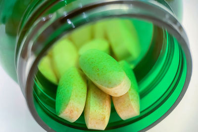 Close-up of pills in container