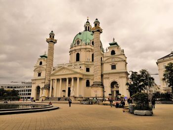 View of historic building against cloudy sky