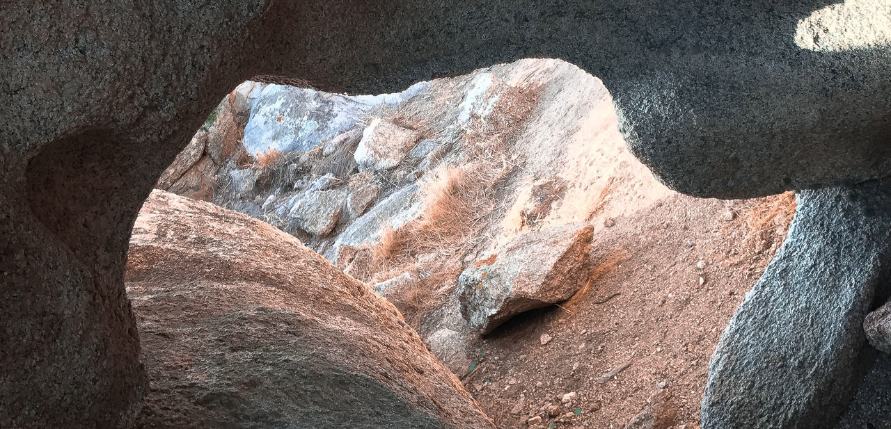 LOW ANGLE VIEW OF ROCK FORMATION