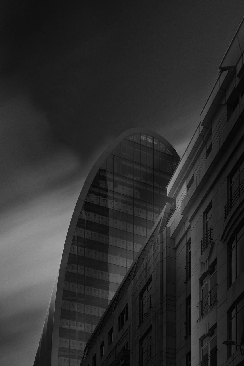 architecture, built structure, building exterior, black and white, darkness, monochrome, city, black, monochrome photography, sky, light, building, skyscraper, white, low angle view, night, no people, reflection, office building exterior, line, cityscape, nature, office, travel destinations, outdoors, tower block