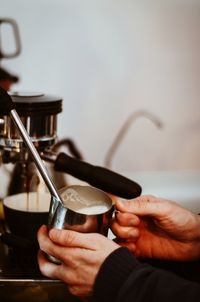 Man holding coffee cup