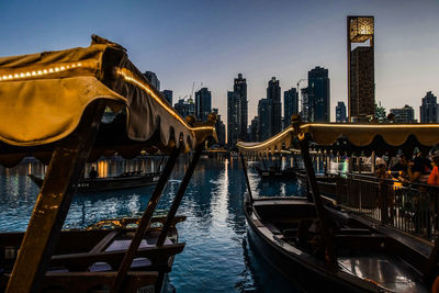 View of buildings in city at dusk