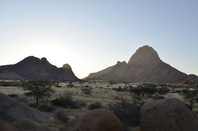 Scenic view of mountains against clear sky