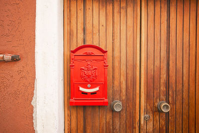 Close-up of red door handle