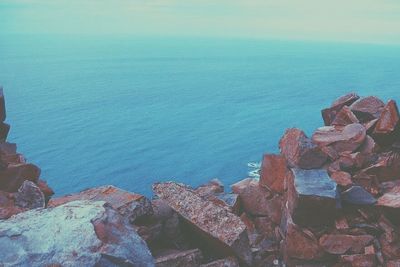 Scenic view of sea against blue sky