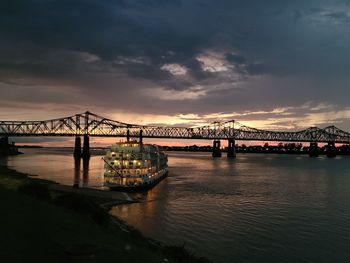 Boat docked at sunset on the mississippi 