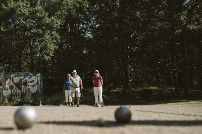 People playing pétanque