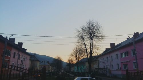 Low angle view of houses against clear sky