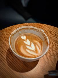 Close-up of cappuccino on table