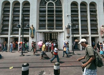 Woman standing in front of building