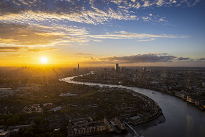 High angle view of city at sunset