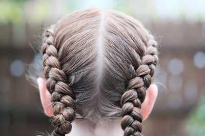 Close-up of girl with braided hair