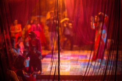 Reflection of woman on stage