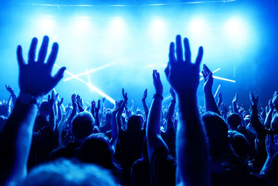 Crowd at music concert during night