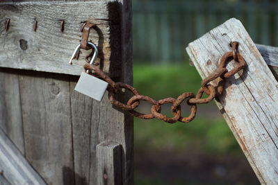 Close-up of padlock on metal door