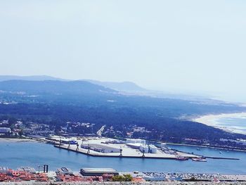 High angle view of harbor by sea against sky