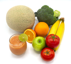 Close-up of fruits against white background