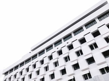 Low angle view of residential building against clear sky